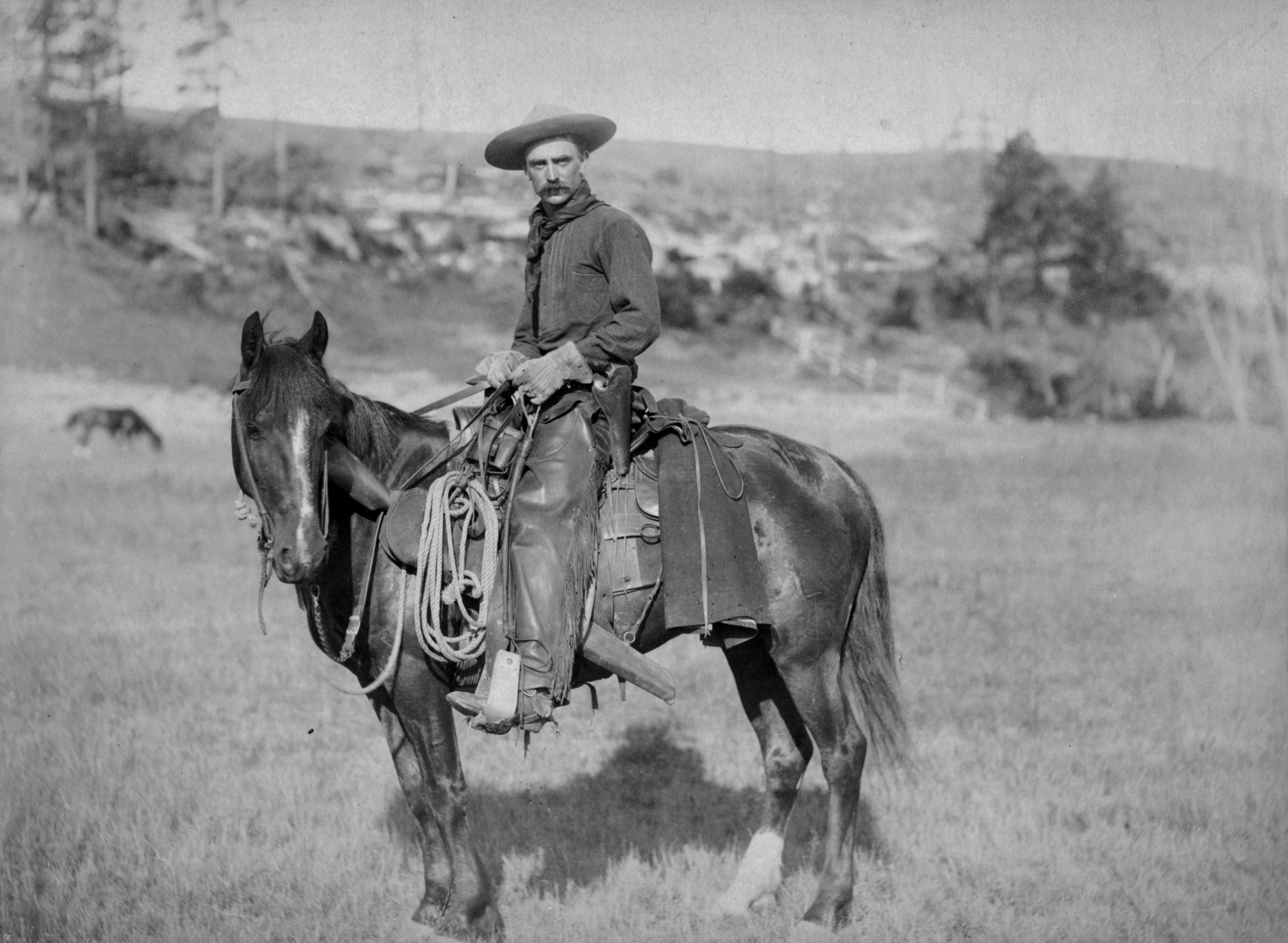 How did cowboys ride horses?